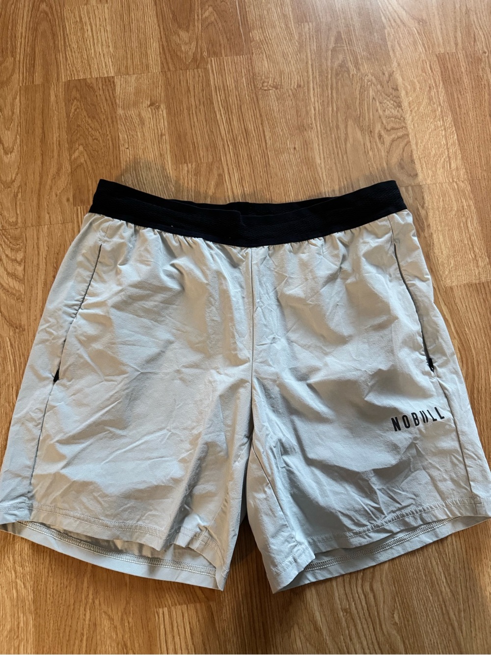 NOBULL Men's Light Gray Training Shorts with Black Waistband